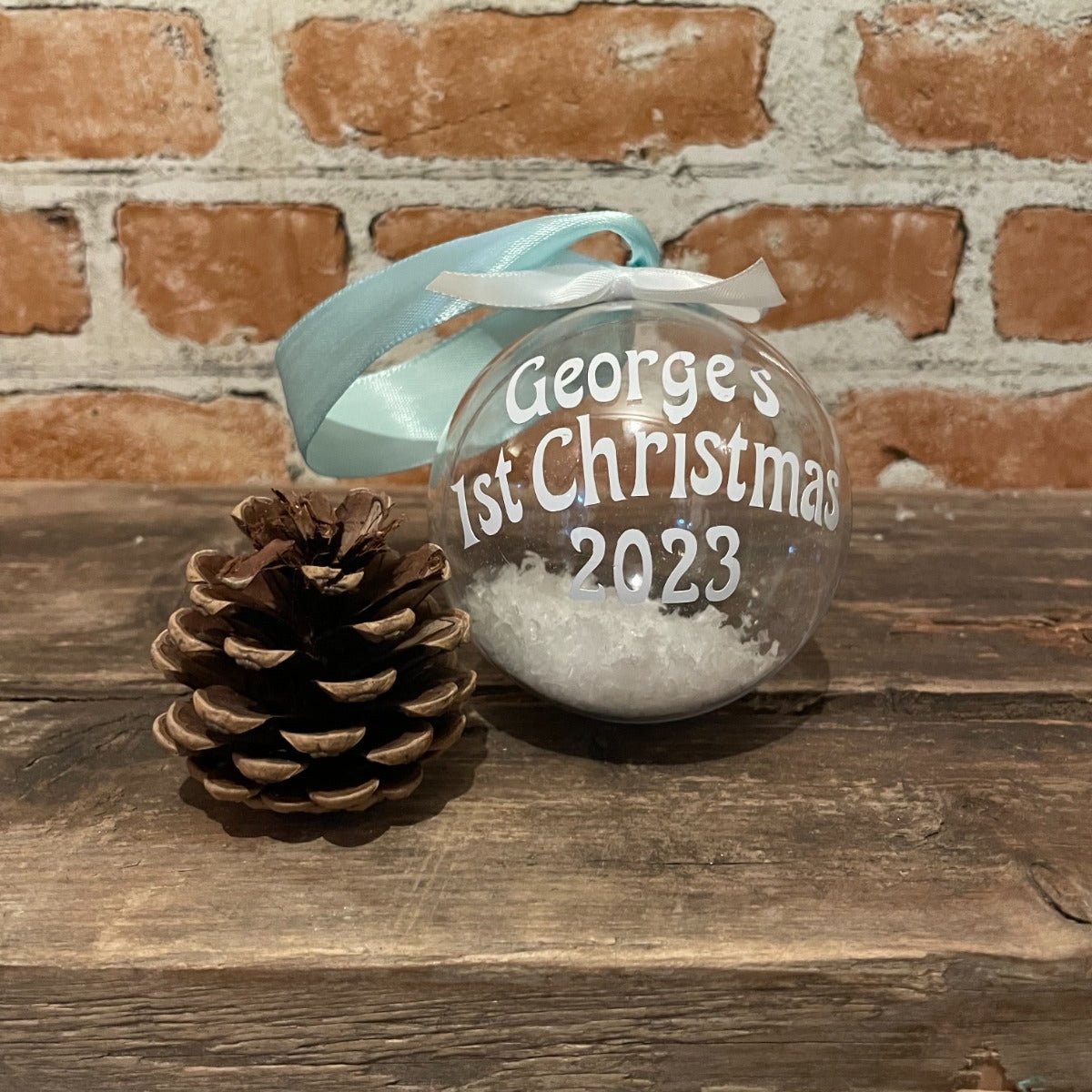 Personalised 1st Christmas Bauble with name, snowflakes and ribbon from The Wrong End of Town